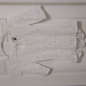 White lace quarter length sleeve blouse with peplum waist